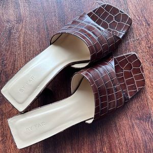 By Far brown leather embossed slides